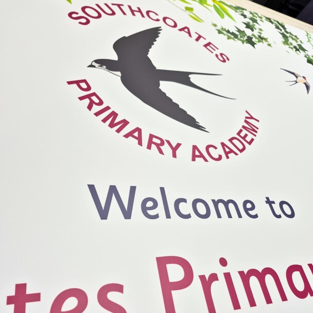 A close-up image of the logo on the Southcoates sign.